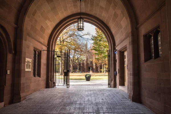 Archway leading to a university campus