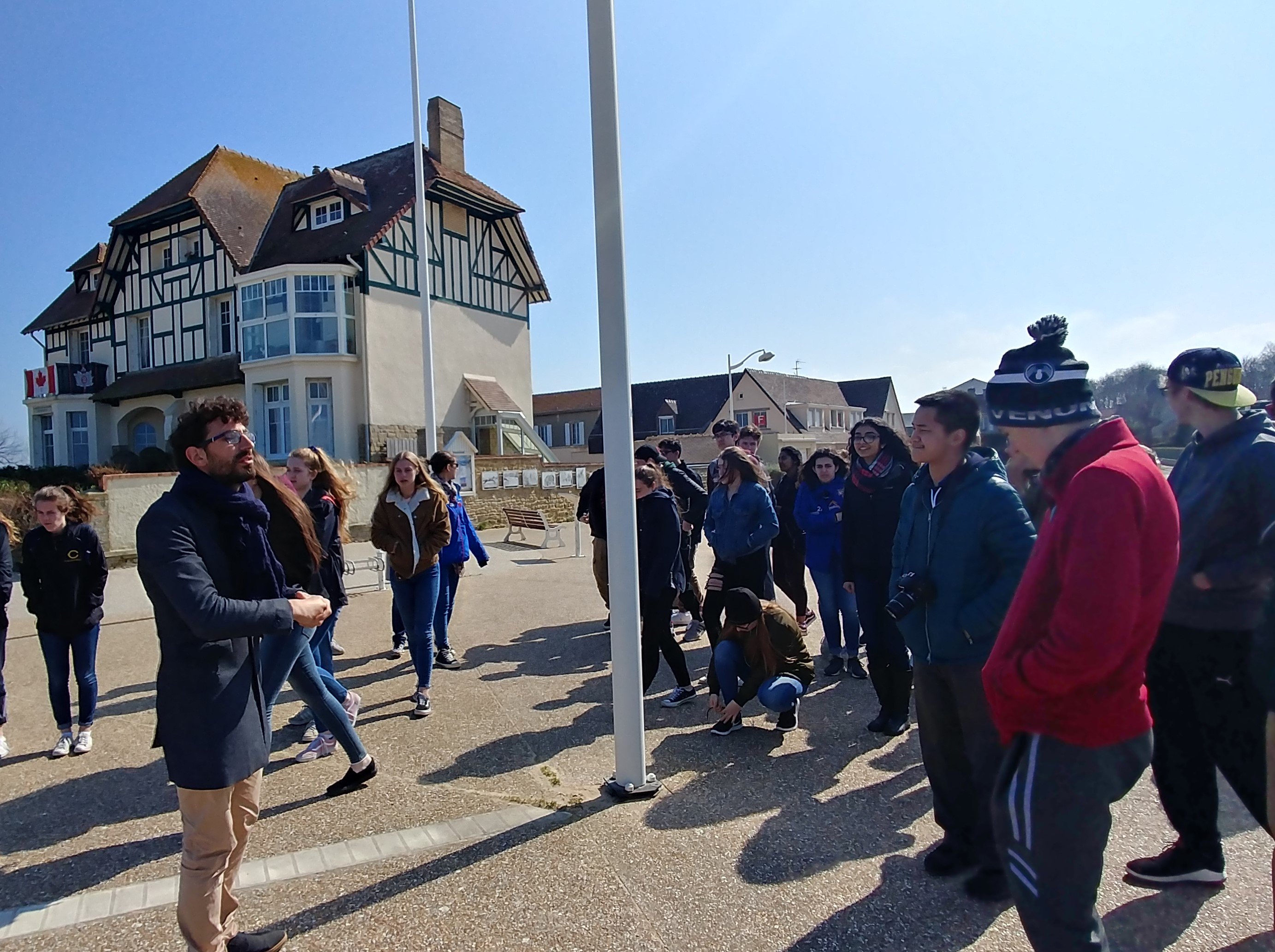 Students in front of Canada House in Arromanches