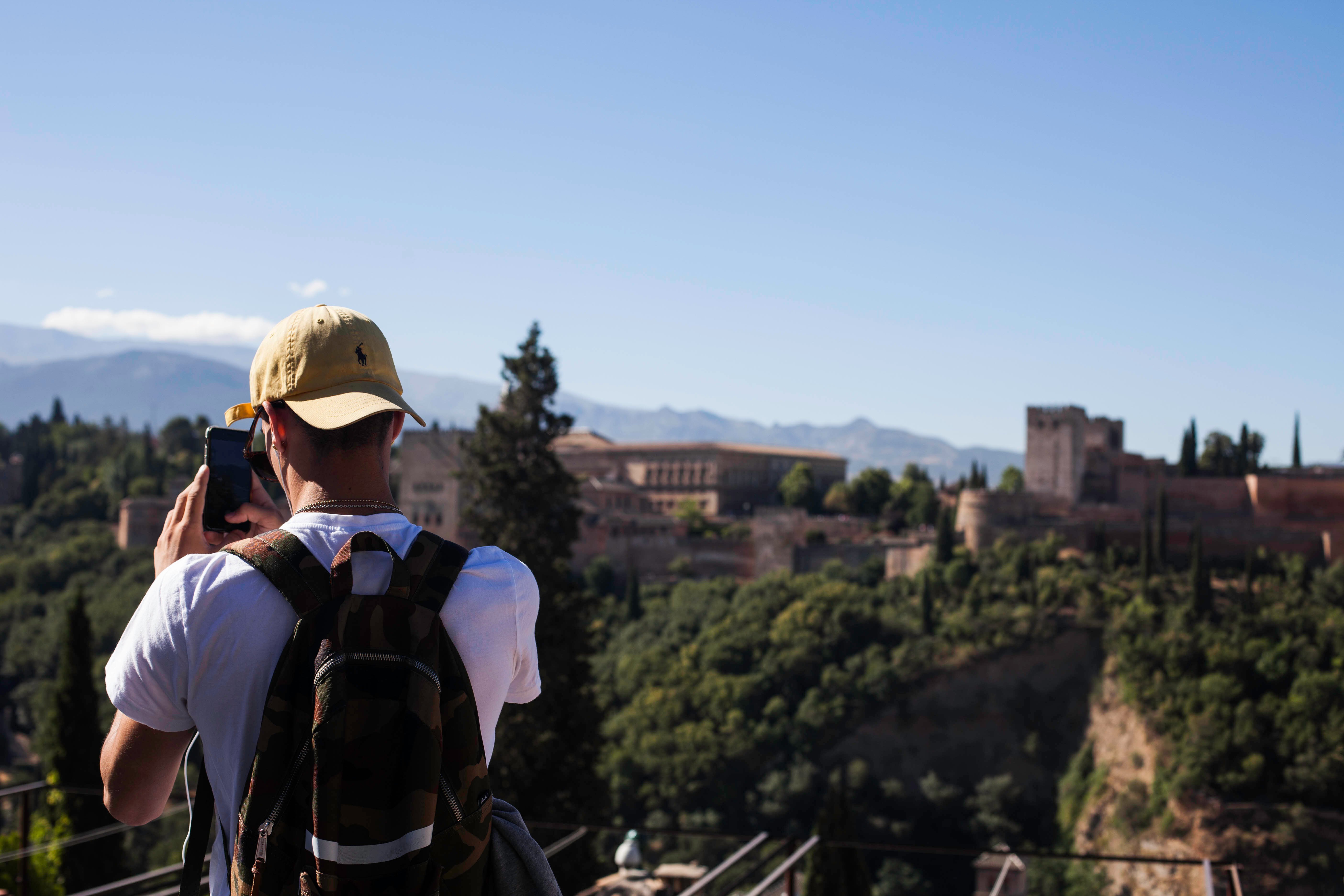 Student taking a picture of an Andalusian landscape 