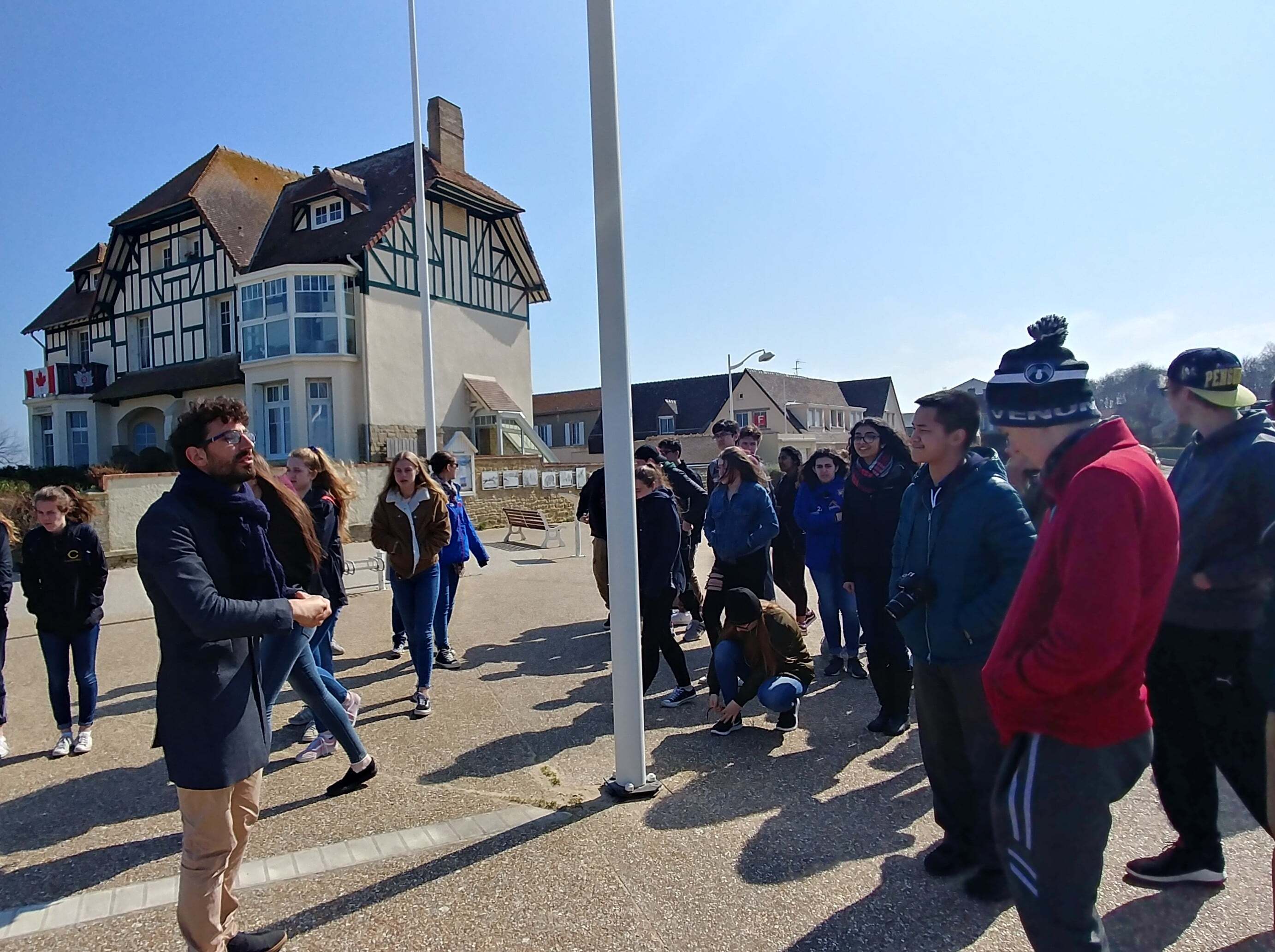 Students in front of Canada House in Arromanches