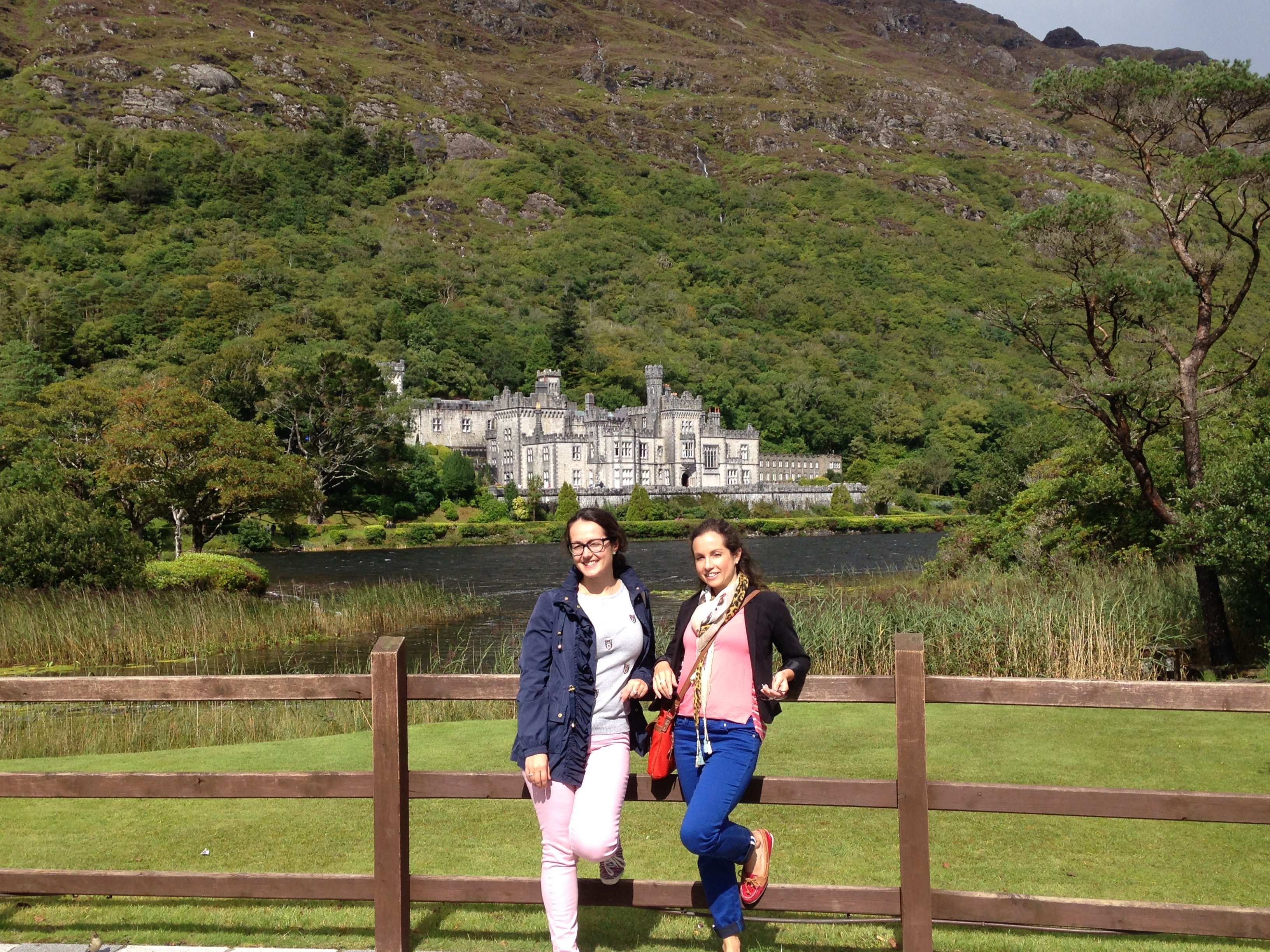 Two student girls in front of Kylemore Abbey 