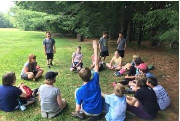Group of students playing games outside.